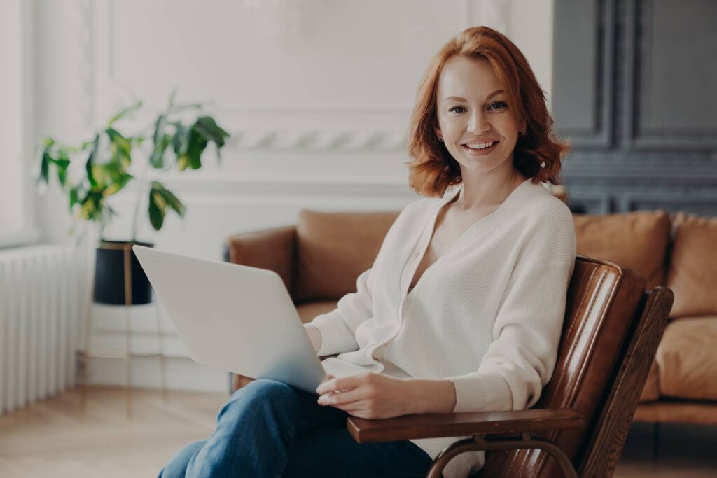 Woman With laptop working as freelancer